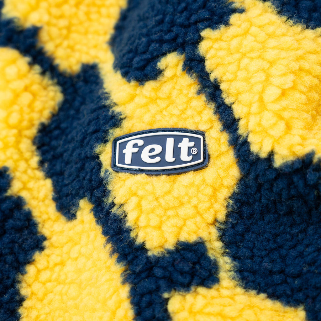 Felt ; Volute Reversible Jacket
Navy & Yellow