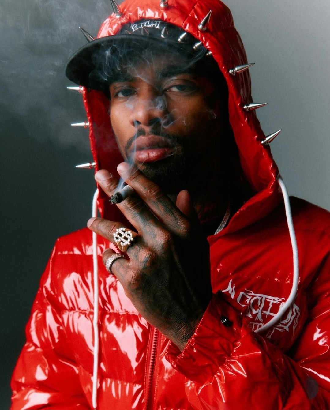 Section 8 - Red spiked puffer jacket